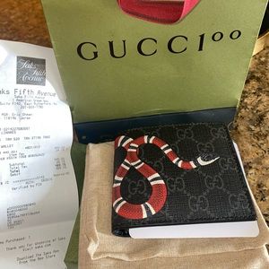 authentic brand new gucci mens wallet with receipt box and shopping bag
